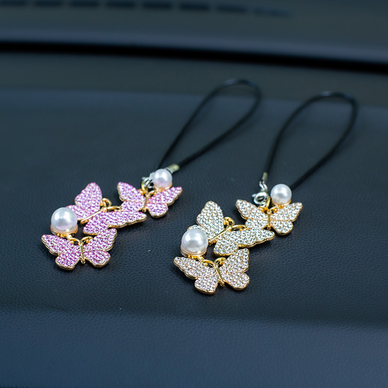 قلادة زينة على شكل فراشة للسيا - مراجعة Car Accessories Evil Eye وسعره